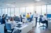 Ein lichtdurchflutetes, modernes Büro mit einem vielfältigen Team aus IT-Experten, die konzentriert vor mehreren Bildschirmen mit komplexen Datenvisualisierungen und Grafiken sitzen, während warme natürliche Sonnenstrahlen den Raum durchfluten und eine einladende, zukunftsorientierte Atmosphäre schaffen.