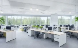 Ein lichtdurchflutetes modernes Büro mit motivierten IT-Fachkräften in entspannter, freundlicher Atmosphäre, die konzentriert und zugleich kollegial an Laptops und digitalen Whiteboards zusammenarbeiten, während warme Sonnenstrahlen das Szenenbild mit natürlichem Glanz und lebendiger Energie erfüllen.