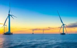 Strahlender Morgenhimmel über einer modernen Offshore-Windfarm, wo sanft drehende Turbinen in warmem Sonnenlicht glänzen und technikaffine Ingenieure in leichter Outdoor-Arbeitskleidung mit Schwerpunkt auf innovative Sensorik konzentriert Wartungsdaten auf Tablets überprüfen, während ruhige Wellen und klare Luft eine positive Atmosphäre von Fortschritt und nachhaltiger Energie vermitteln.