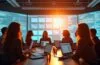 Ein hell erleuchtetes, modernes Büro mit jungen Entwicklern und IT-Expert:innen in angeregtem Austausch vor großen Bildschirmen, die komplexe Daten und Cloud-Architekturen visualisieren, in warmer Morgensonne mit lebendiger, einladender Atmosphäre, die Fortschritt, Vernetzung und die Zukunft von Cloud-Native-Technologien und KI widerspiegelt.