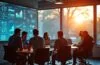 In einem modern gestalteten, lichtdurchfluteten Büro sitzt eine diverse Gruppe von Forschern und Entwicklern konzentriert um einen großen Bildschirm, auf dem komplexe Daten und KI-Modelle schemenhaft erkennbar sind, während warmes Sonnenlicht durch große Fenster fällt und eine Atmosphäre von Offenheit, Zusammenarbeit und verantwortungsvoller Innovation ausstrahlt.